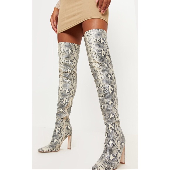 snakeskin boots over the knee